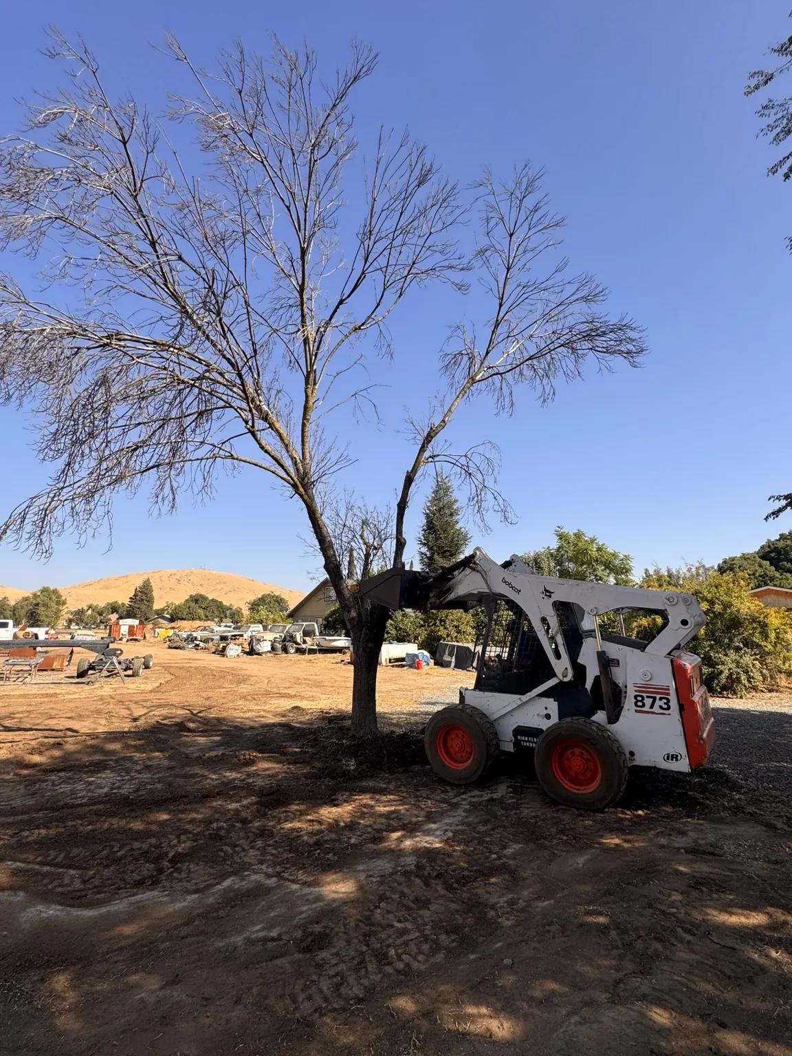 V1 equipment working on a property